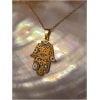 Collier fleur oeil
