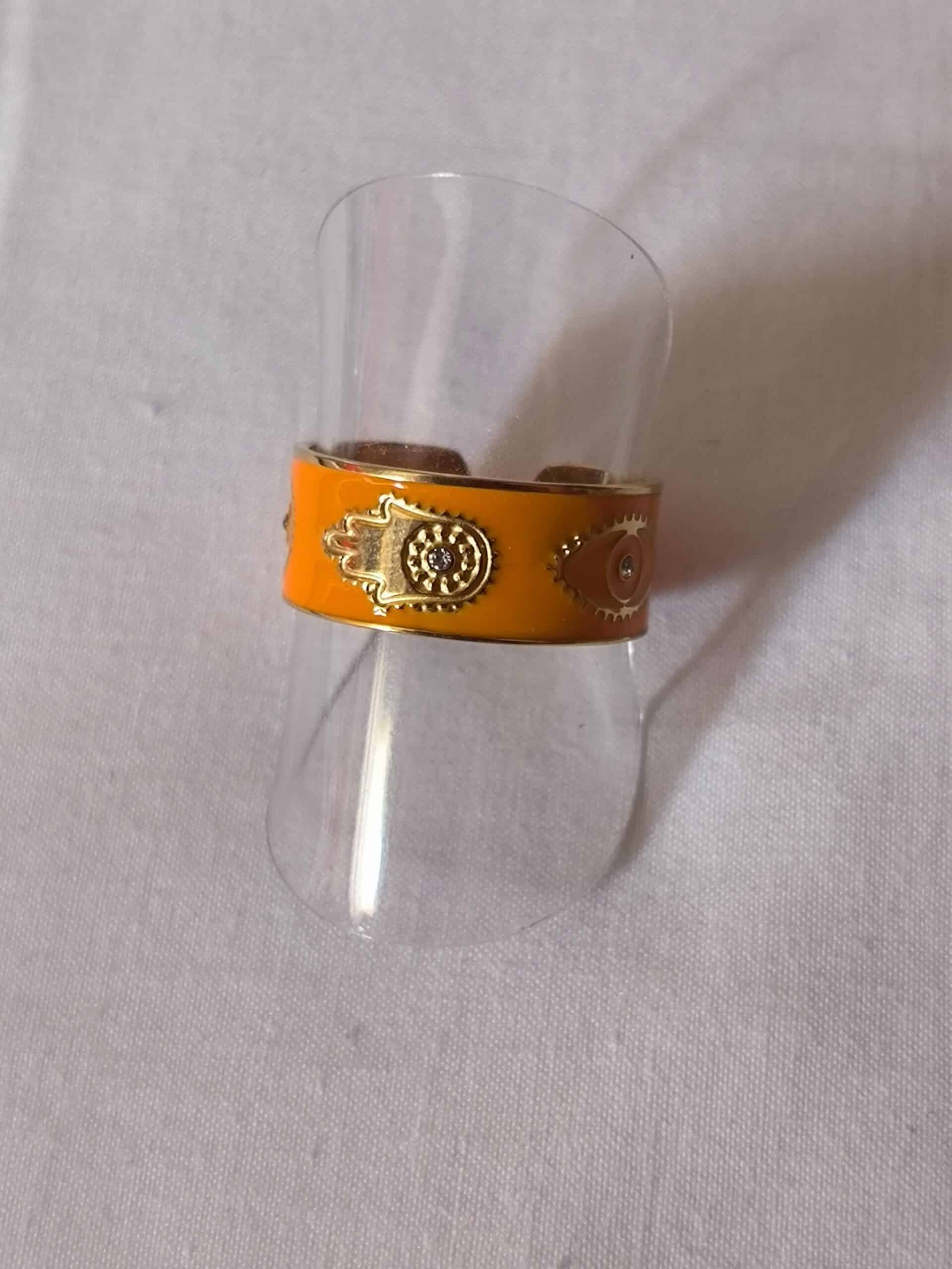 Bague main oeil orange