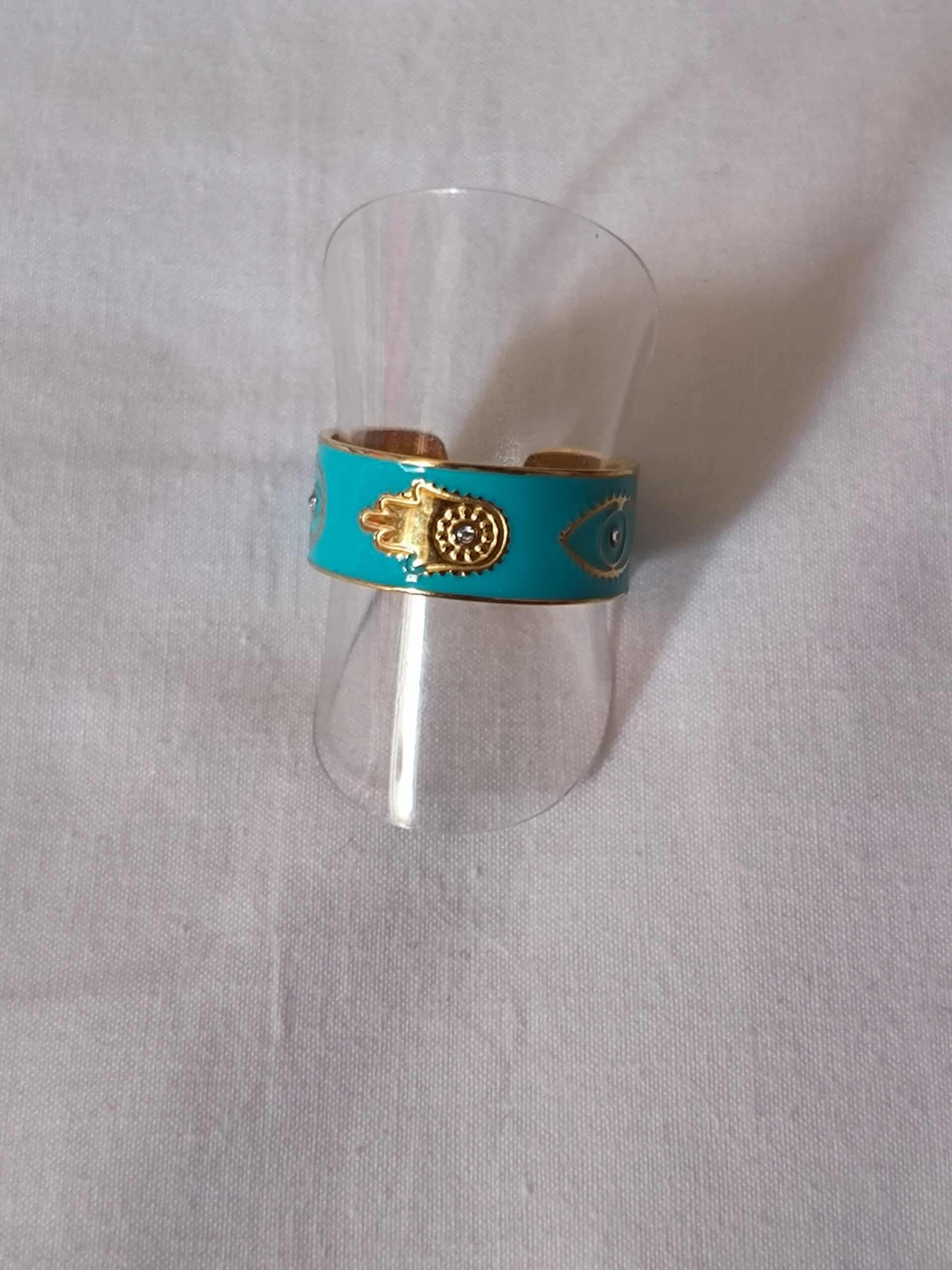 Bague main oeil bleu