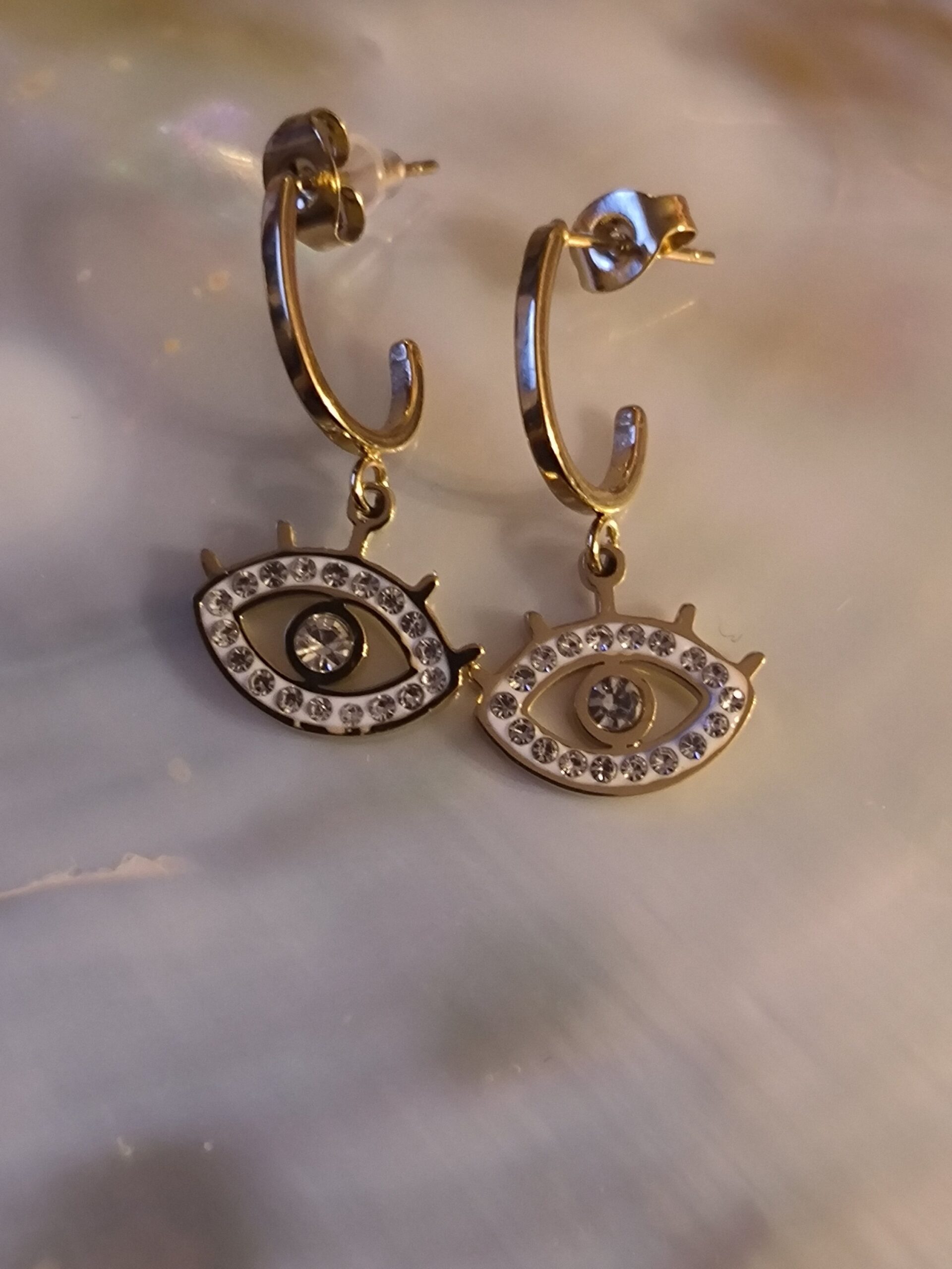 Boucle d'oreille oeil diams